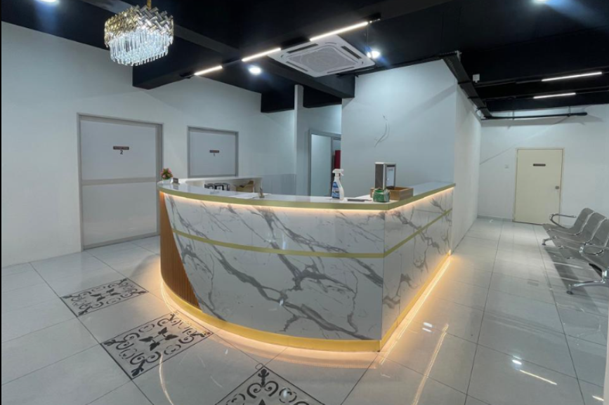 Clinic reception with plaster ceiling and lighting installation